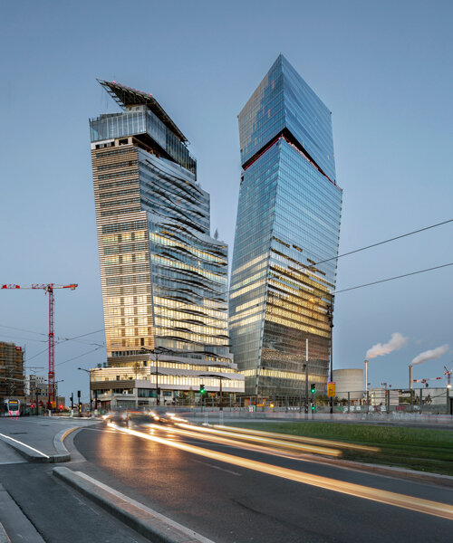 jean nouvel's 'tours duo' nears completion in paris, defined by leaning posture