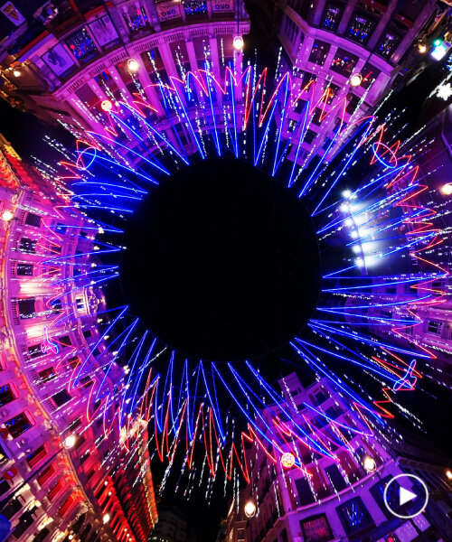 eye-shaped installation by brut deluxe brightly looks at people in madrid