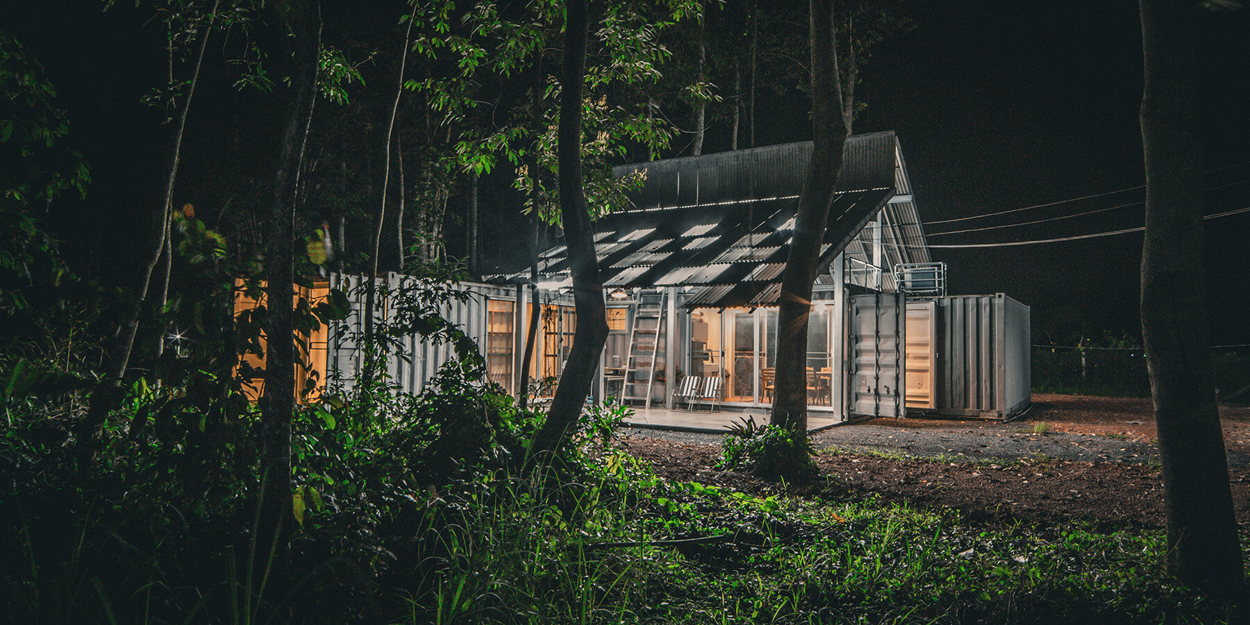 shipping-containers-prefabricated-see-through-shelter-thai-forest-designboom-1800-01