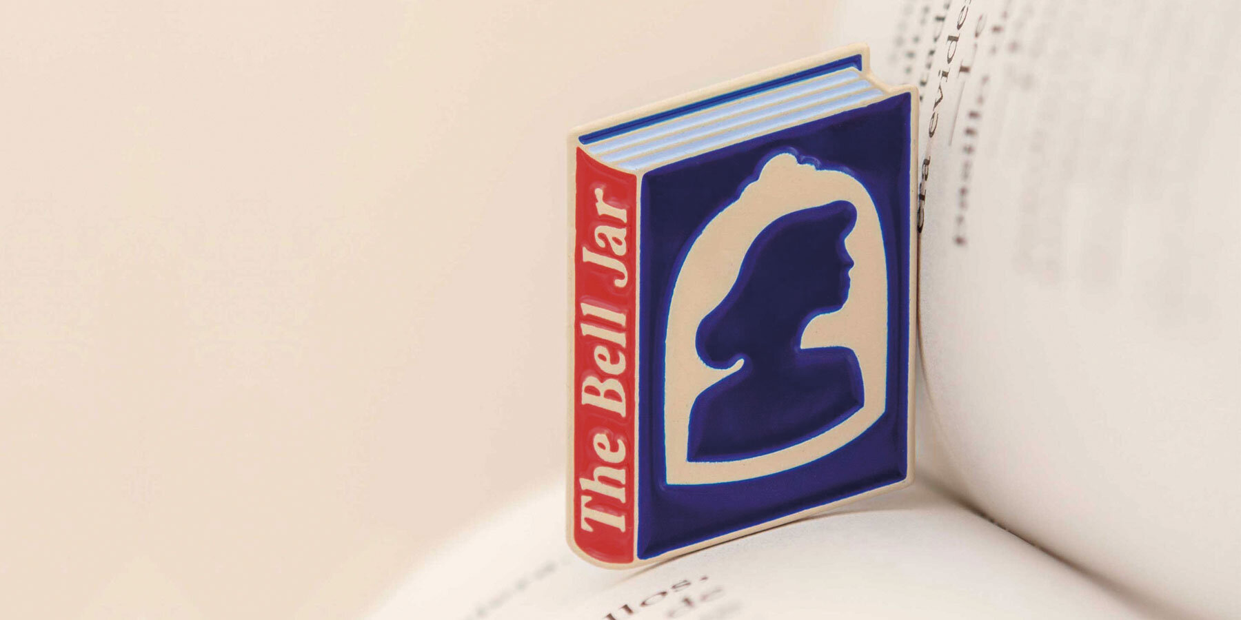 judy-kaufmann-enamel-pins-bibliophiles-wear-books-designboom-01